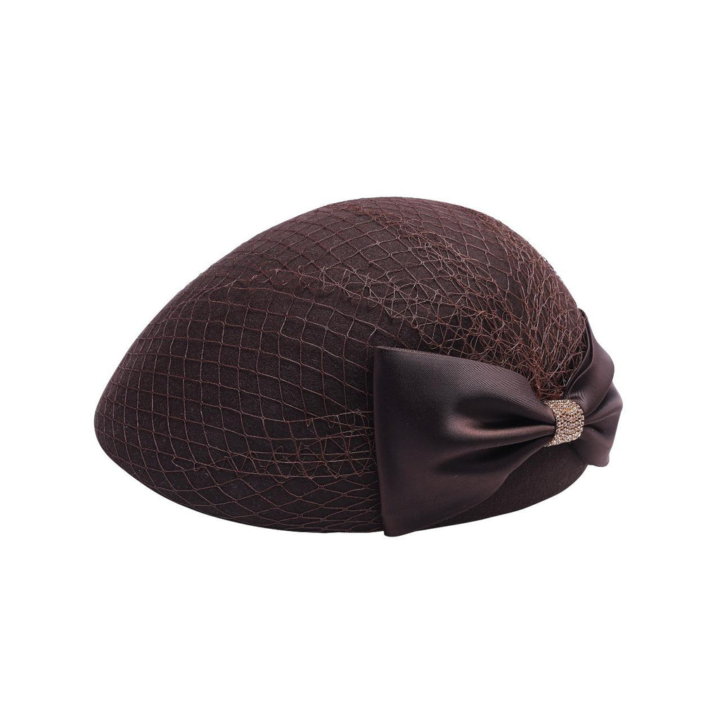 Ladies wool cloche hat with net veil and rhinestone bow, front view