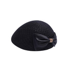 Wool cloche hat with rhinestone accent bow and net veil detail