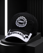 Newcastle black baseball cap with white peak and NEWCASTLE lettering, product view 5