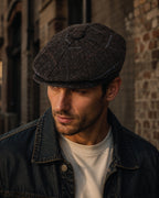 Check tweed baker boy hat, close up of fabric texture